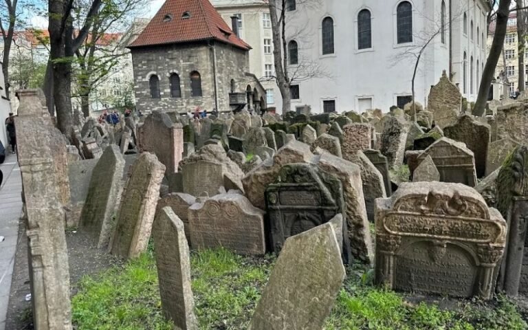 ancient stone headstones in a cemetary